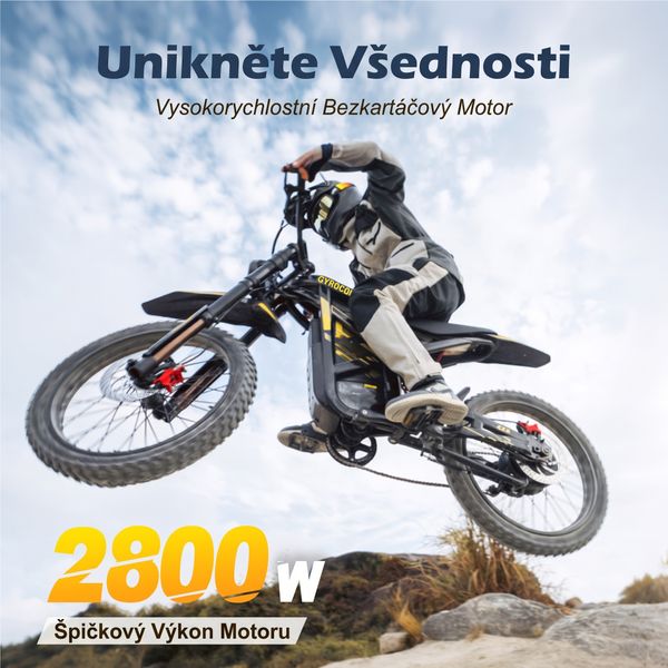 Jezdec ve vzduchu na terénním elektrickém kole s grafikou uvádějící špičkový výkon 2 800 W